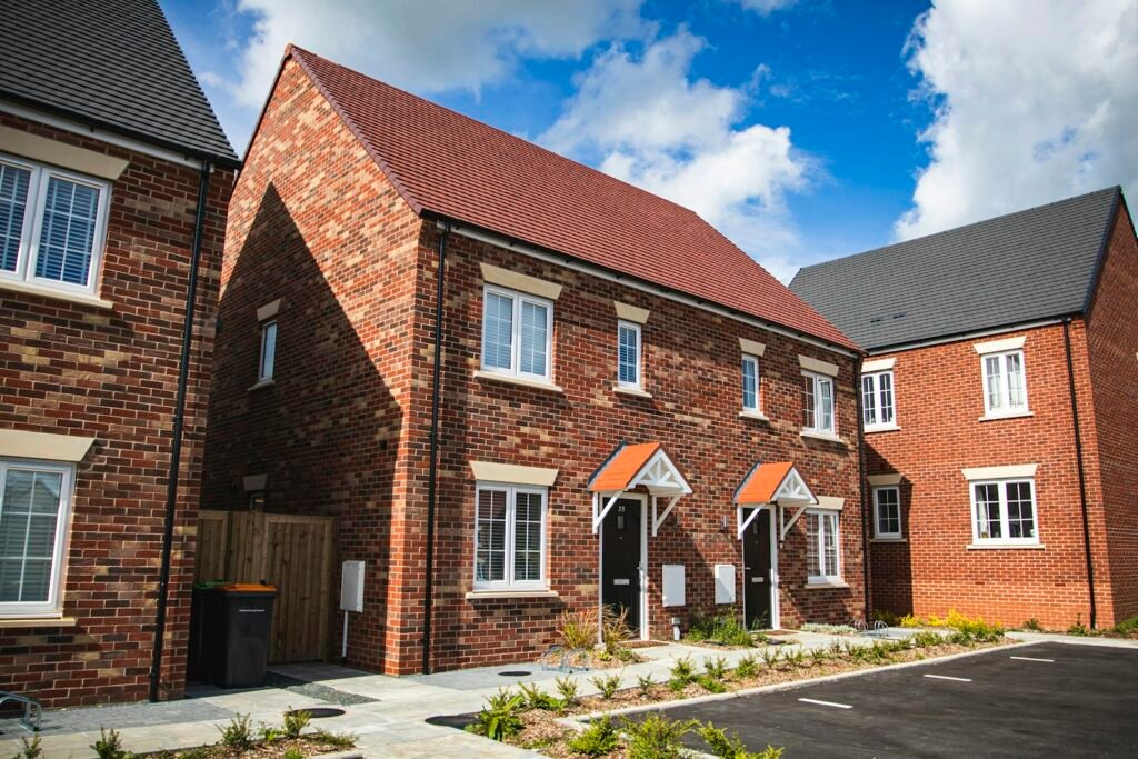 UK brick terraced house under blue sky, used for mortgage calculator guide